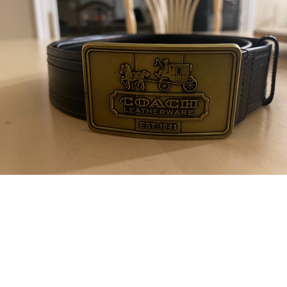 Vintage coach carriage, black leather belt. .